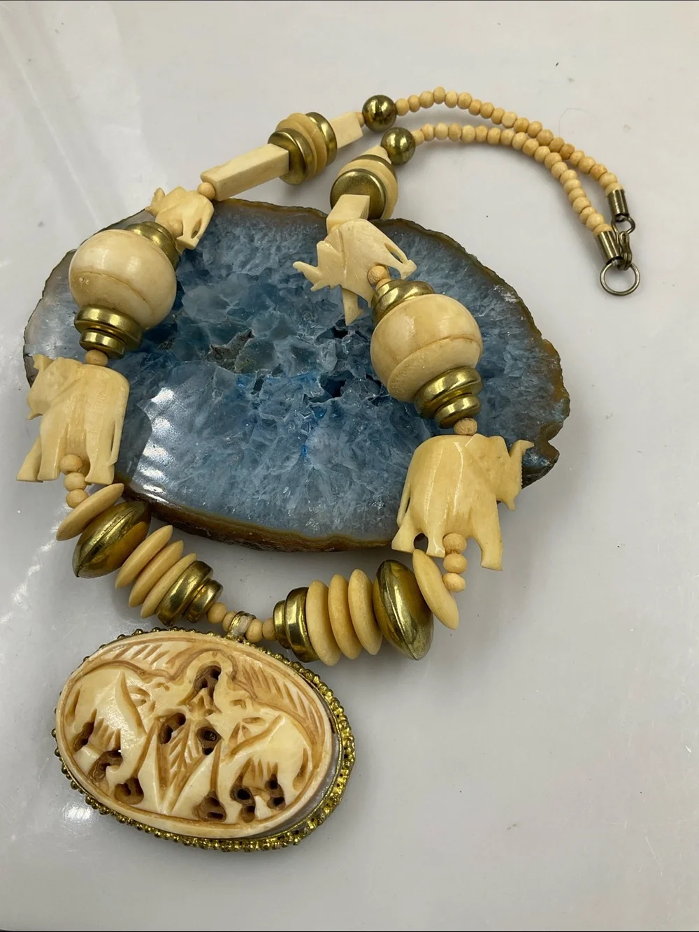 Vintage 1960 Gold Tone Hand Carved Bone Elephant Pendant Statement Necklace